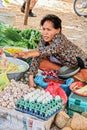 Cambodia Woman selling fruits and vegetables in rural Market Cambodia