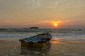 Cambodian boat during sunrise on the beach of Koh Rong Island Royalty Free Stock Photo