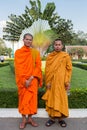 Cambodian Buddhist monks posing in the King's palace, Phnom Penh