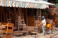 Cambodian cabinet maker at work