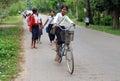 Cambodian children going to school by bycicle Royalty Free Stock Photo