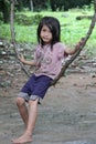 Cambodian Girl On a Tree Swing