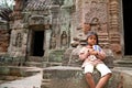 Cambodian Kid at Angkor Wat Royalty Free Stock Photo