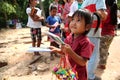 Cambodian Kid Selling Postcards Royalty Free Stock Photo