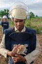 Cambodian mine-sniffing rat and handler