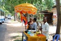 Cambodian old men stand give information and receive religious donated from Cambodia people and foreign traveler travel visit