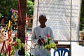 Cambodian old men stand give information and receive religious donated from Cambodia people and foreign traveler travel visit