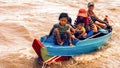 Cambodian people live on Tonle Sap Lake in Siem Reap, Cambodia. Cambodian family on a boat near the fishing village of Tonle Sap L