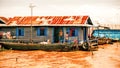 Cambodian people live on Tonle Sap Lake in Siem Reap, Cambodia. Unidentified people in a Floating village on the Tonle Sap Lake