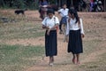 Cambodian school girls on path