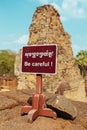 Be Careful Warning sign in Angkor Wat Temple