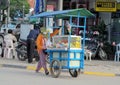 Cambodian women sells food on the street