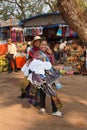 Cambodian women wait for tourists