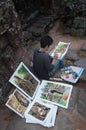 Cambodian young painter at the temple Banteay Kdei temple.Angkor. Siem Reap. Cambodia