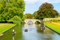 Cambridge, Cambridgeshire, United Kingdom - AUG 28, 2019: Tourists on punt trip along River Cam near Kings College in the city of Royalty Free Stock Photo