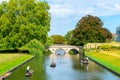 Cambridge, Cambridgeshire, United Kingdom - AUG 28, 2019: Tourists on punt trip along River Cam near Kings College in the city of Royalty Free Stock Photo