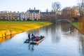 Cambridge, River Cam and tourist's boats at sunset Royalty Free Stock Photo