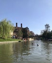Cambridge, UK - April 20, 2019: View of Jerwood library and the orgasm bridge crossing the river Cam on a sunny day Royalty Free Stock Photo