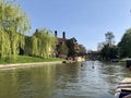 Cambridge, UK - April 20, 2019: View of Jerwood library and the orgasm bridge crossing the river Cam on a sunny day Royalty Free Stock Photo