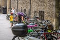 Cambridge, UK, August 1, 2019. Bicycles parked along the narrow street