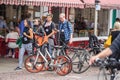 Cambridge, UK, August 1, 2019. Bicycles parked outside a restaurant along the narrow street