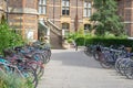 Cambridge, UK, August 1, 2019. Bicycles parked outside a Sedgwick Museum along the narrow street