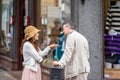 Cambridge, UK, August 1, 2019. International couple Having Conversation On A Street