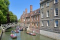 Wooden Mathematical Bridge at Queens College University with tourists and students punting on the river Cam Royalty Free Stock Photo