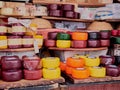 Cambridge, UK - October 9, 2019: Cambridge market square. Market stall with various cheeses. Close up