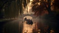 Cambridge, United kingdom - Boats floating in a row and people enjoying punting on river during autumn sunset at