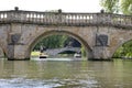 Punting on the River Cam in Cambridge on a sunny day. Royalty Free Stock Photo