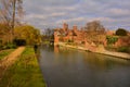 Cambridge university building and Punting on river Cam, UK Royalty Free Stock Photo