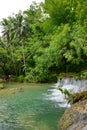 Cambugahay Falls, a 3-tiered waterfall popular for swimming on Siquijor Island in Philippines