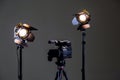 Camcorder and 2 spotlights with Fresnel lenses in the interior. Shooting an interview Royalty Free Stock Photo