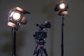 Camcorder and 2 spotlights with Fresnel lenses in the interior. Shooting an interview Royalty Free Stock Photo