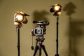 Camcorder and the two spotlights with Fresnel lenses Royalty Free Stock Photo