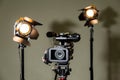 Camcorder and the two spotlights with Fresnel lenses Royalty Free Stock Photo