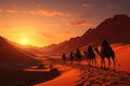 Camel caravan in the desert at sunset. Travel Concept. Background with a copy space. Royalty Free Stock Photo