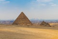 Camel caravan in front of the Great Pyramid of Menkaure Royalty Free Stock Photo