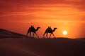 Camel caravan in the Sahara desert at sunset. 3d rendering, Camel caravan on sand dunes on Arabian desert with Dubai skyline at Royalty Free Stock Photo