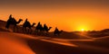 Camel caravan silhouette through the sand dunes in the Sahara Desert, Morocco Royalty Free Stock Photo