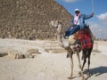 Camel driver at the piramids of Gizeh Royalty Free Stock Photo