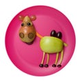 Happy camel made with fruits on pink plate Royalty Free Stock Photo