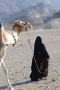 Camel ride - berberian woman Royalty Free Stock Photo