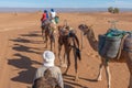 Camel ride in Sahara desert Royalty Free Stock Photo