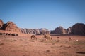 Camels, at a tourist tent camp in the Wadi Rum desert in Jordan Royalty Free Stock Photo