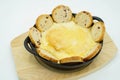 Camembert cheese fondue with whole wheat toast Royalty Free Stock Photo