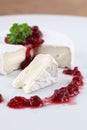 Camembert with cranberry jam Royalty Free Stock Photo