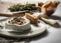 Camembert with honey, walnuts and toast close up