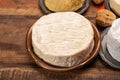 Camembert, moist, soft, creamy, surface-ripened cow's milk chees